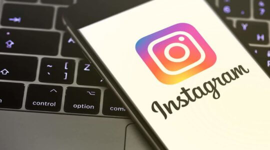 iPhone displaying the Instagram logo. Social media. Instagram is a photo-sharing app for smartphones. Moscow, Russia - March 26, 2019